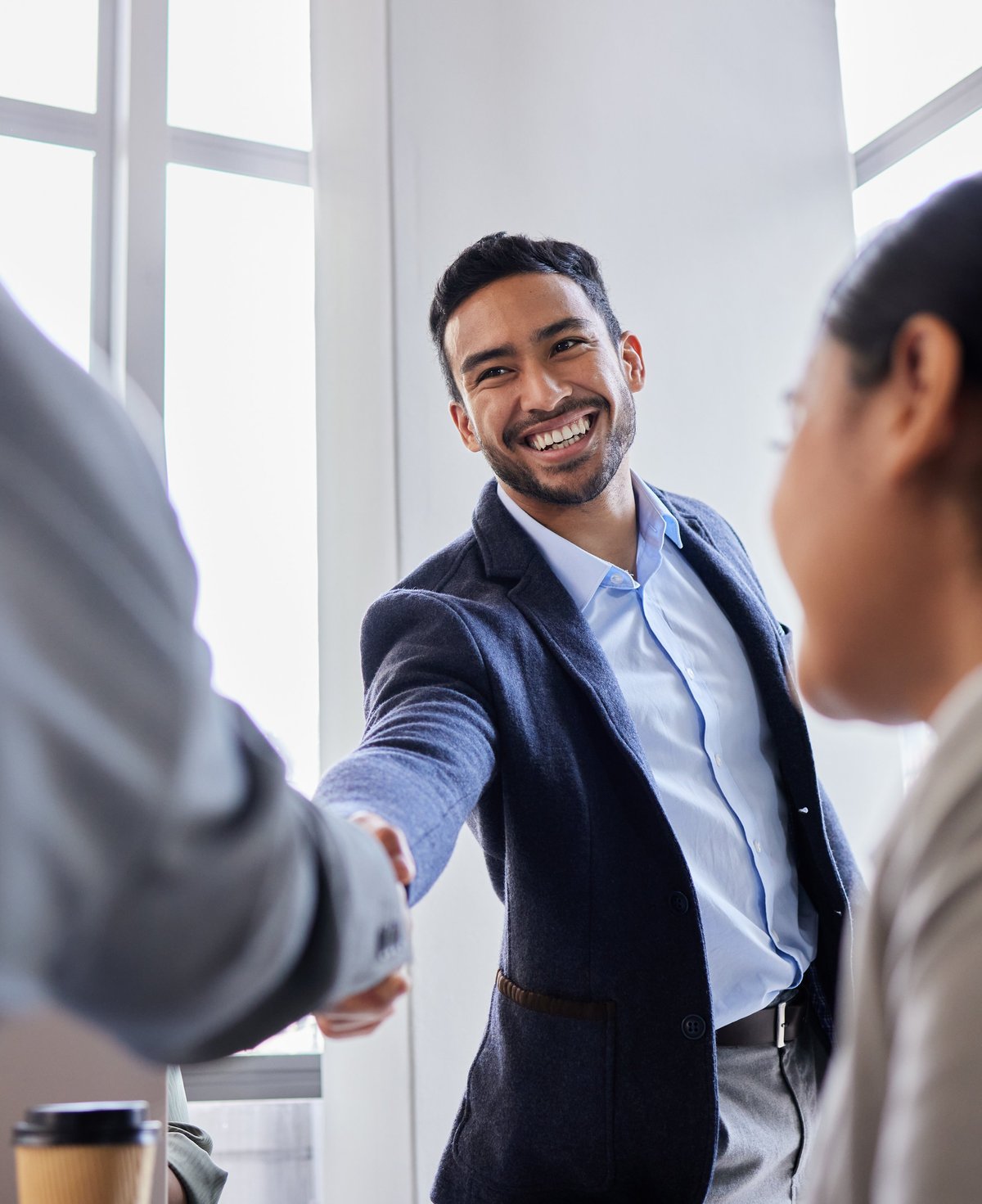 Pleased to meet you - warm genuine greeting between professionals