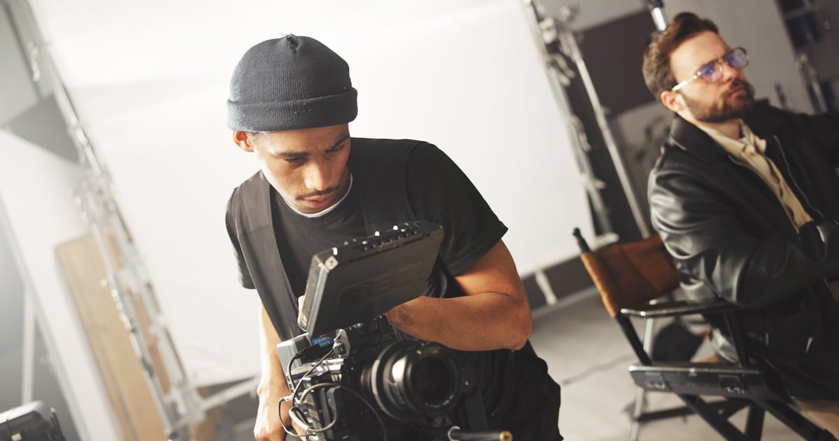 Film, production and videography with cameraman on set for cinematic recording of footage