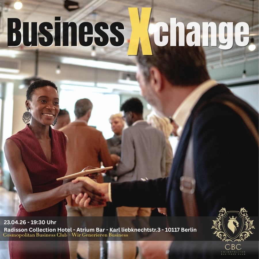 Business professionals exchanging business cards at a networking event with the text Business Xchange displayed above